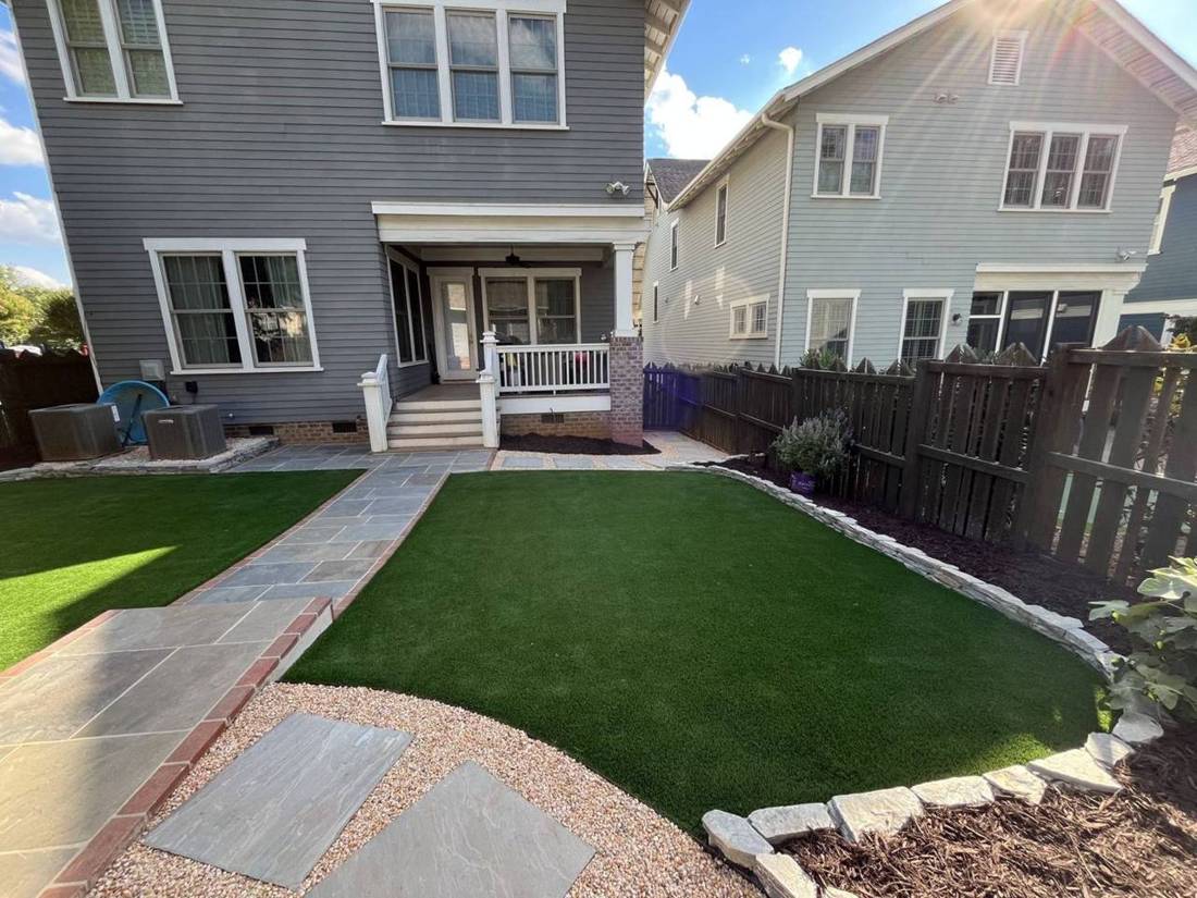 After: bluestone walk with brick border, turf and stone edging